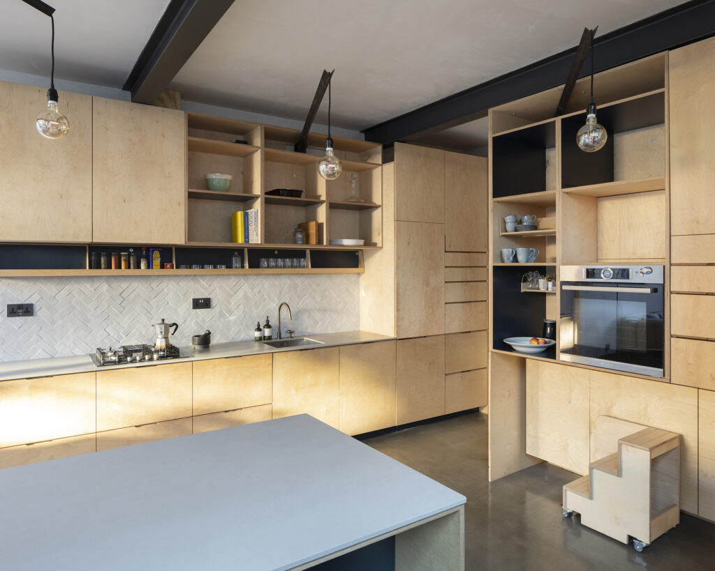 A side and rear return contemporary kitchen extension in Kensal Green by RISE Design Studio