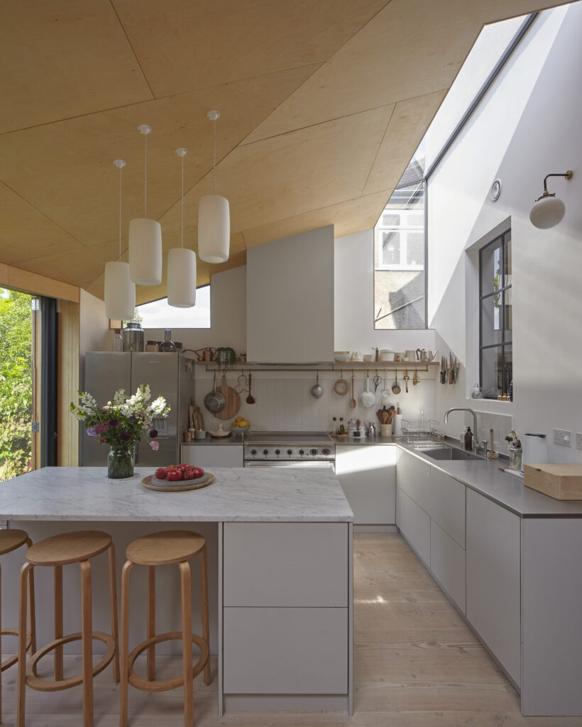 View of kitchen in Douglas House in Kensal Rise, North West London, by RISE Design Studio