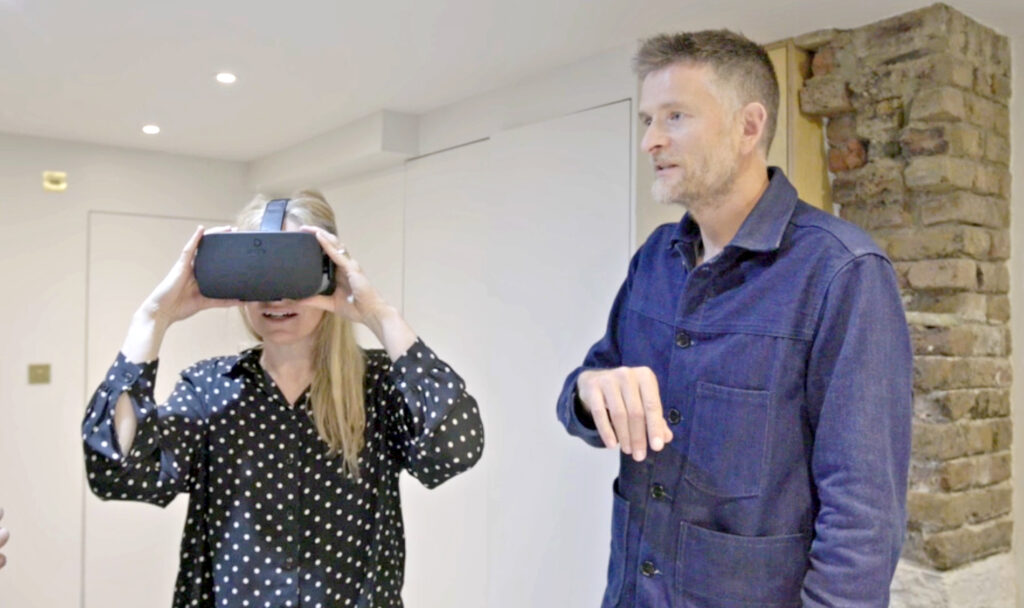 Sean shows a Client their project via VR Goggles, where she can walkthrough her project virtually