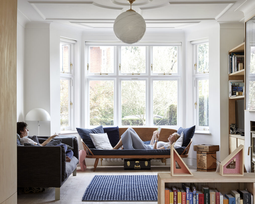 Image of two architects on sofa in house renovation project in Kensal Rise