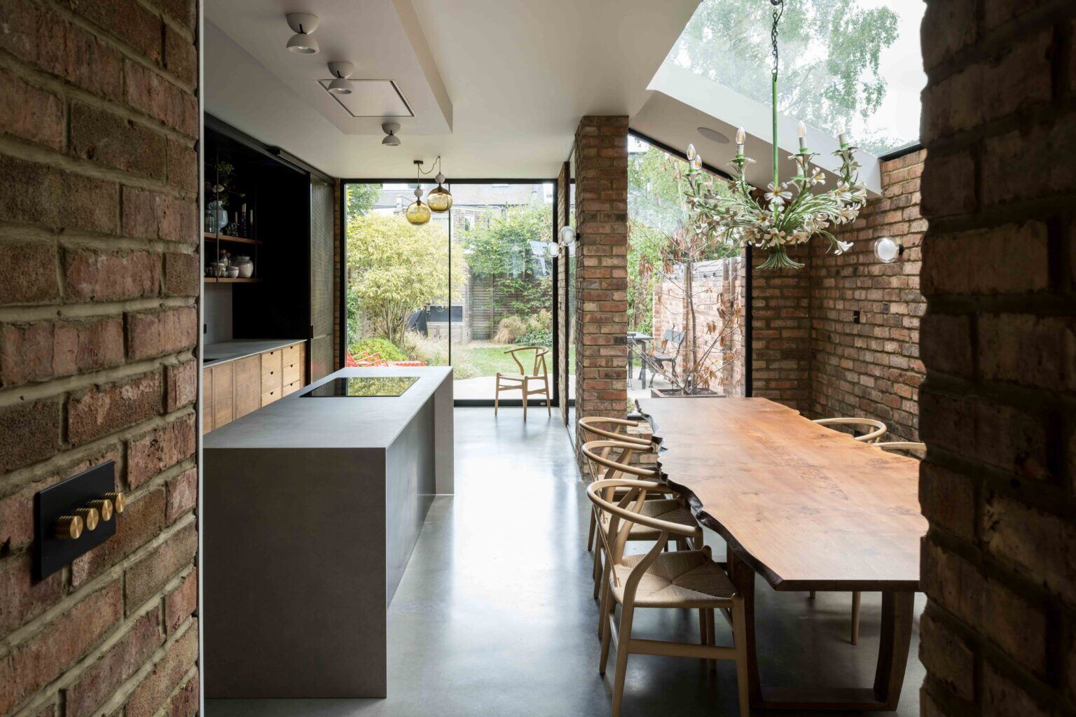 View of the kitchen dining space in our Queen's Park House project in NW London by RISE Design Studio