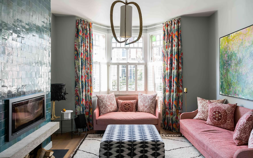 a London architect's inspired living room with bright curtains