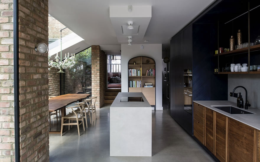 an architect designed dining room in West London with a white plynth